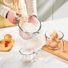 imageKOMUEE 4 Piece Glass Measuring Cups Set 5 Oz 1Cup 2Cup 4Cup Liquid Measuring Cups with Lids for Kitchen Freezer and Microwave Safe